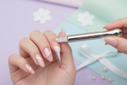 Cat Eye Magnetic Rod being used to create cat eye nail effect - lifestyle photo